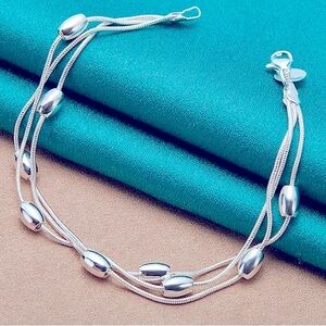 Three-Strand Silver Bracelet with Polished Silver Beads NWOT